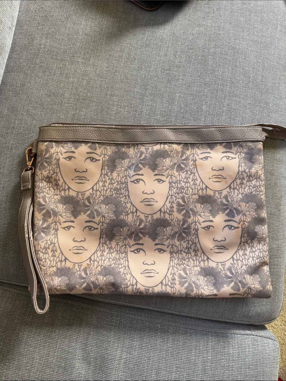 Manuhealii Beige Floral Face Print Wristlet Clutch